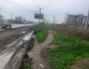 Жители улиц рядом с Мариупольским шоссе в Таганроге просят поставить светофор